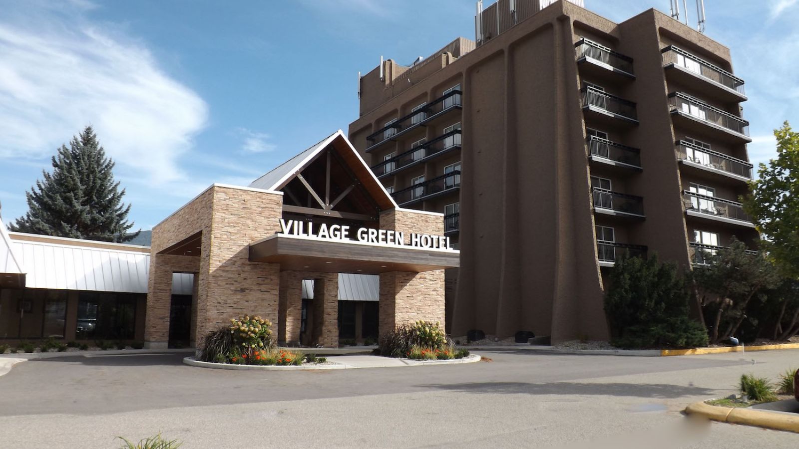 Front View of the Village Green Hotel Vernon